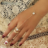  Gold Slave Bracelet and Chevron Cut Ring 